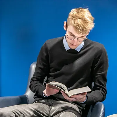 a student reads a book